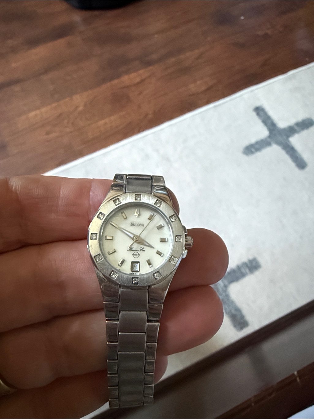 Bulova Silver Watch With White Dial And Diamond Accents